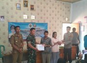 Sukseskan Pilkada, Kapolsek Gunung Labuhan Beri Himbauan Saat Monitoring Penyaluran BLT Dana Desa